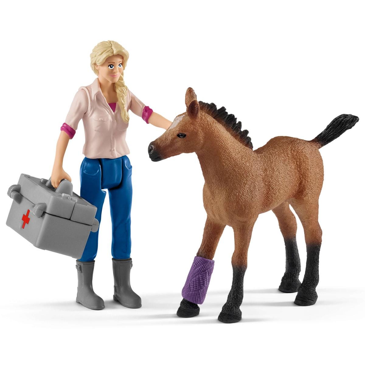 Vet visiting mare and foal