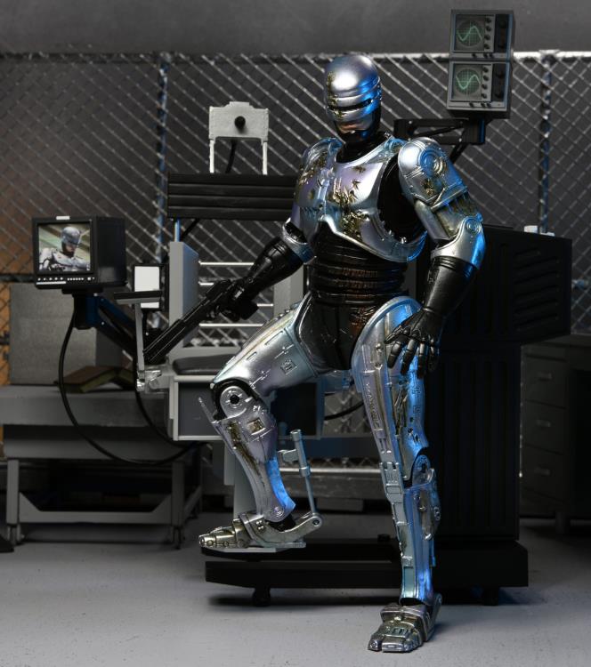 NECA - Ultimate Battle Damaged RoboCop with Chair