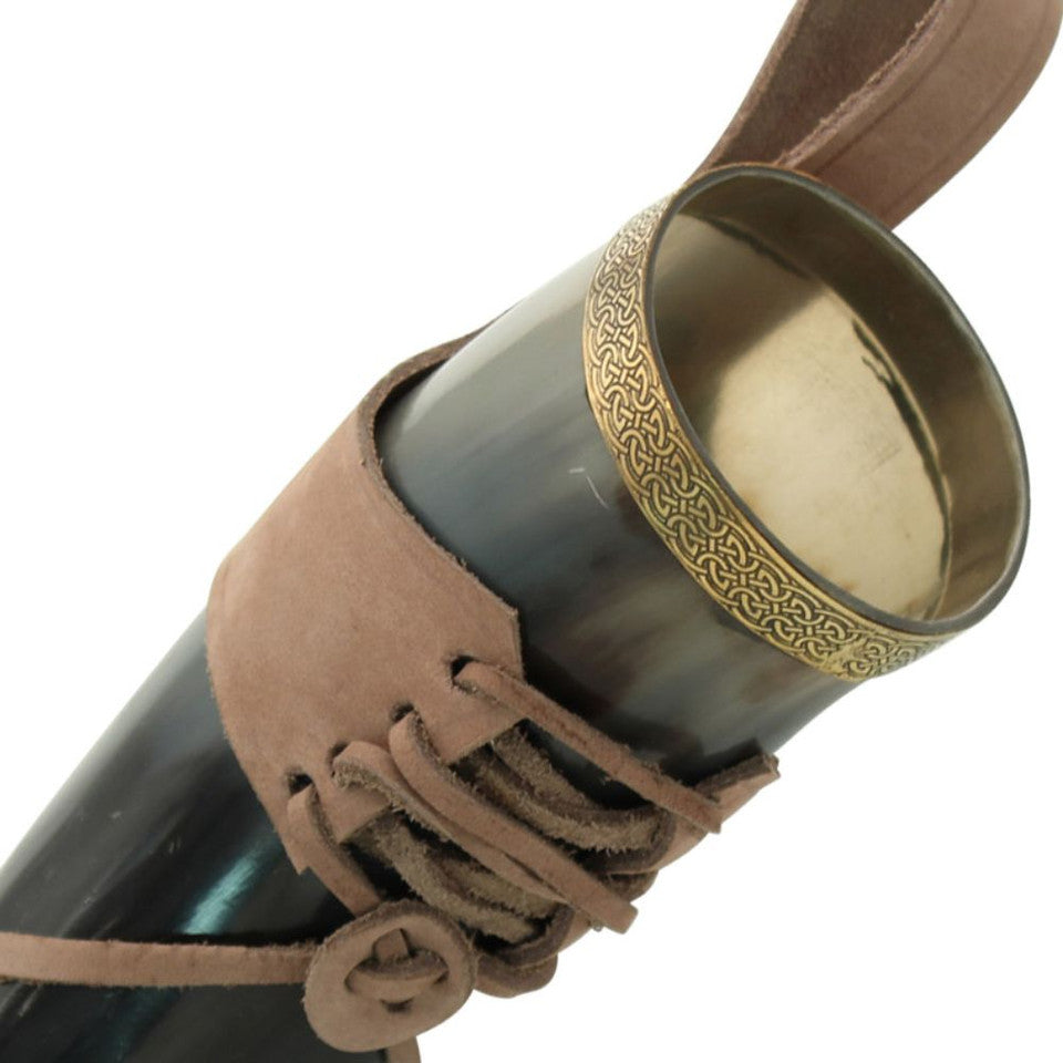 https://cdn.shopify.com/s/files/1/0925/7092/products/Celtic-Elegance-Brass-Adorned-Medieval-Drinking-Horn-with-Leather-Holder-IN4232LHBR-2.jpg?v=1697774927