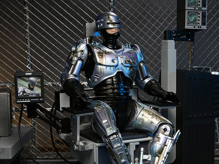NECA - Ultimate Battle Damaged RoboCop with Chair