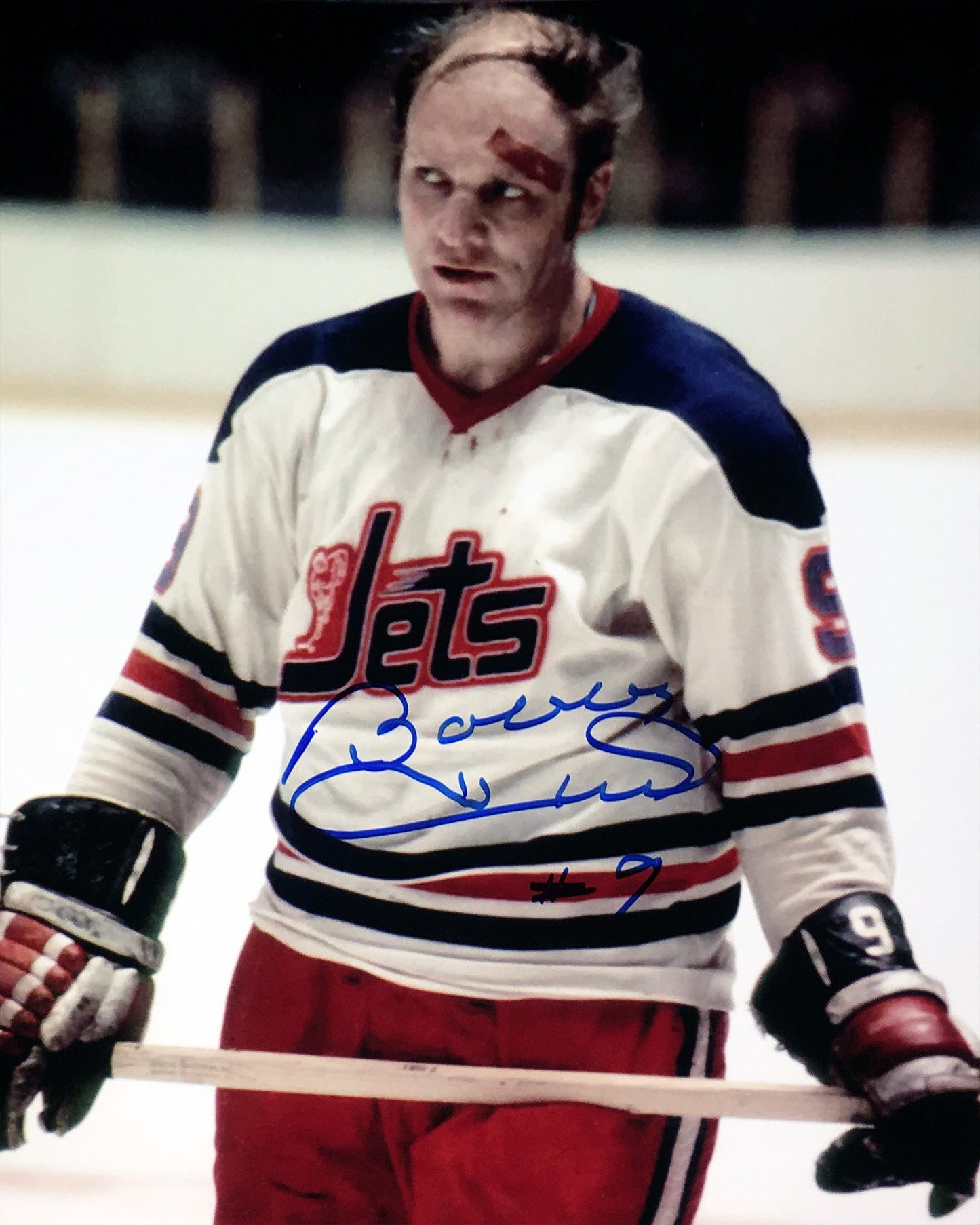 BOBBY HULL AUTOGRAPHED WINNIPEG JETS 8" X 10" BLOODY PHOTO – RARE SIGNED NHL HOCKEY COLLECTIBLE (10" X 8")