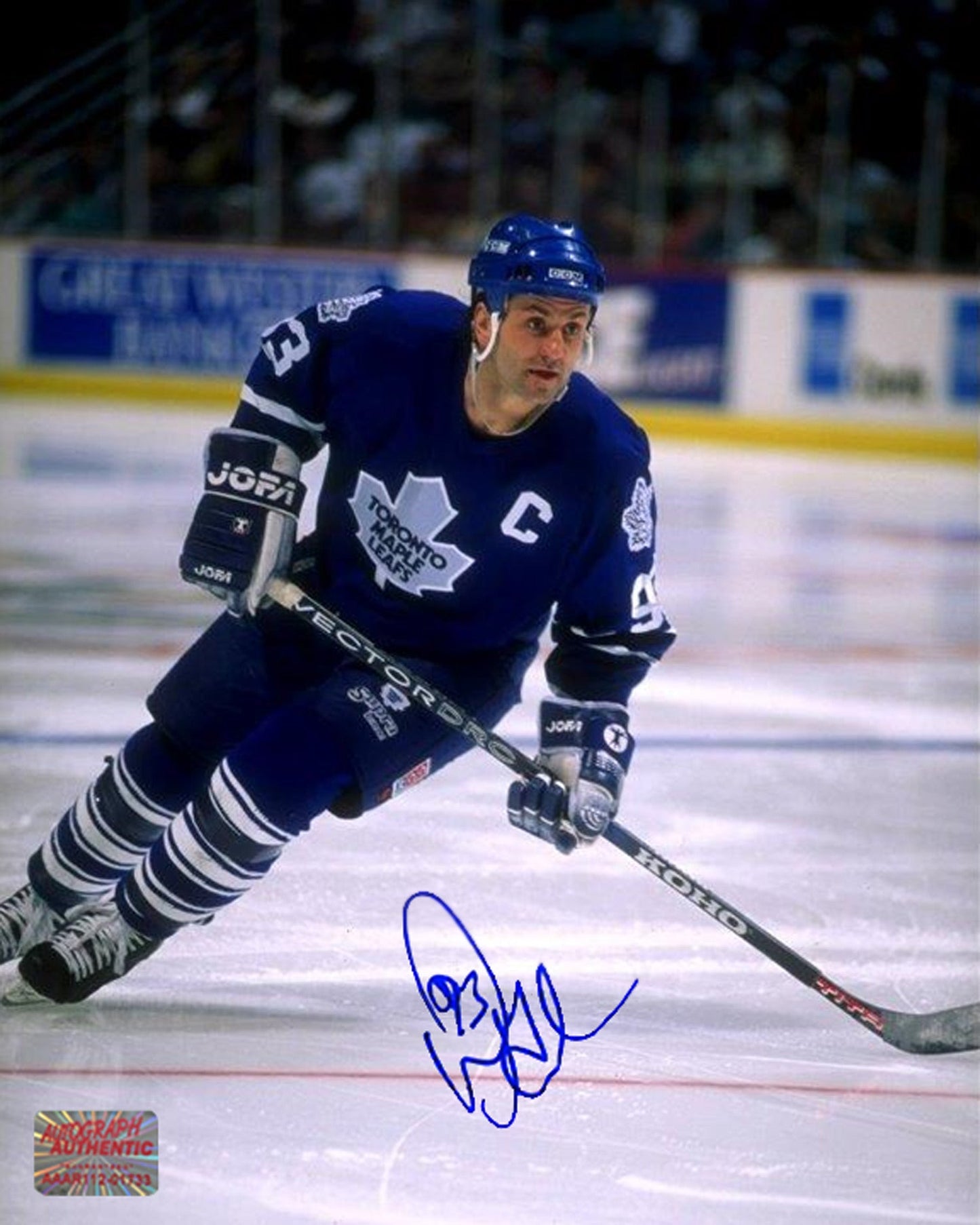 DOUG GILMOUR AUTOGRAPHED 8" X 10"BLUE JERSEY PHOTOGRAPH – TORONTO MAPLE LEAFS NHL SIGNED COLLECTIBLE (8" X 10")
