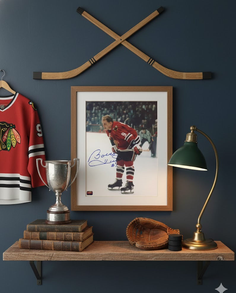 BOBBY HULL AUTOGRAPHED 8" X 10"RED JERSEY STANDING PHOTOGRAPH – CHICAGO BLACKHAWKS NHL SIGNED COLLECTIBLE (8" X 10")