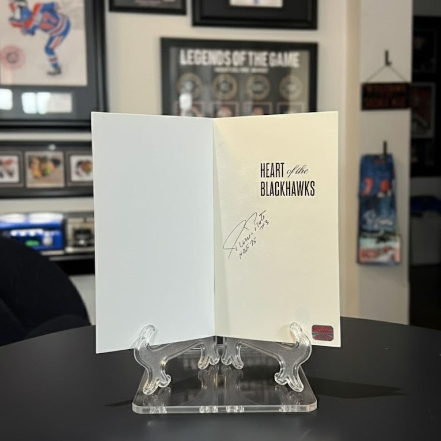 HEART OF THE BLACKHAWKS SOFTCOVER BOOK SIGNED BY PIERRE PILOTE - AUTOGRAPHED HOCKEY MEMOIR 9 X 6 INCHES - CHICAGO HOCKEY LEGEND COLLECTIBLE MEMORABILIA