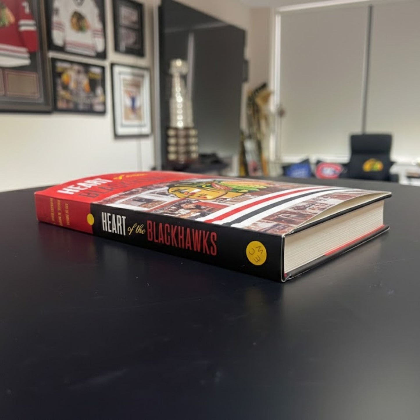 HEART OF THE BLACKHAWKS SOFTCOVER BOOK SIGNED BY PIERRE PILOTE - AUTOGRAPHED HOCKEY MEMOIR 9 X 6 INCHES - CHICAGO HOCKEY LEGEND COLLECTIBLE MEMORABILIA